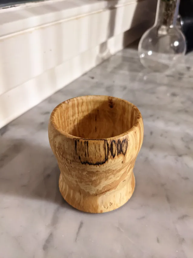 Turned cup